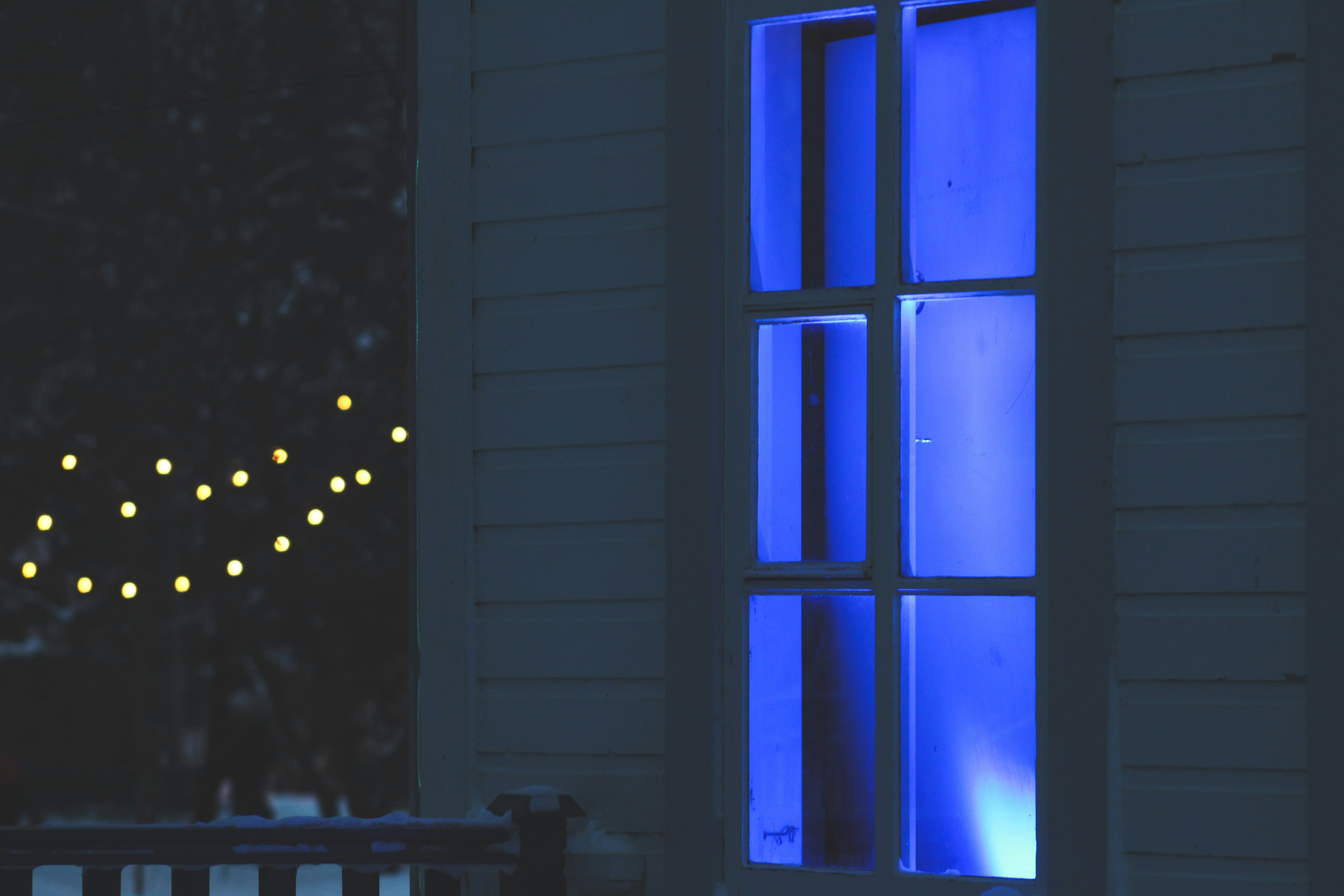 white wooden framed glass window